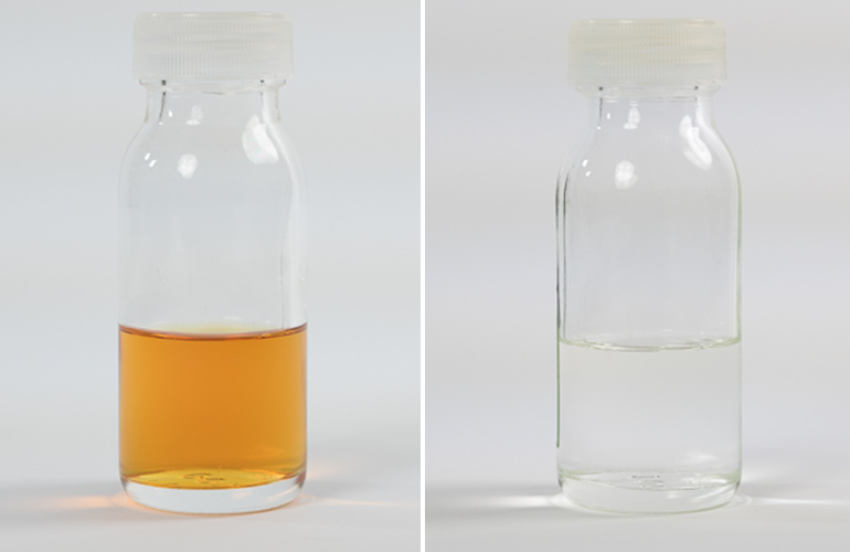 Dark liquid in a bottle before treatment using a scavenger resin, and clear liquid in the bottle after treatment.