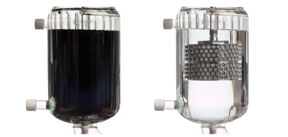 Photograph of an RBR reactor holding liquid prior treatment (dark blue) and after treatment (colourless, clear)