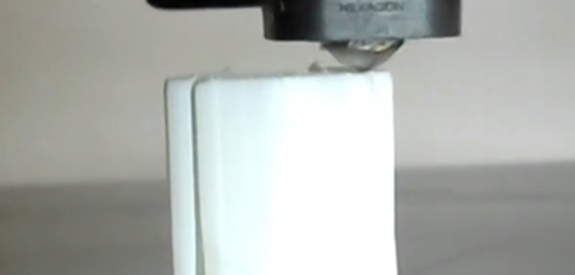 A plastic cartridge for a rotating bed reactor being 3D-printed